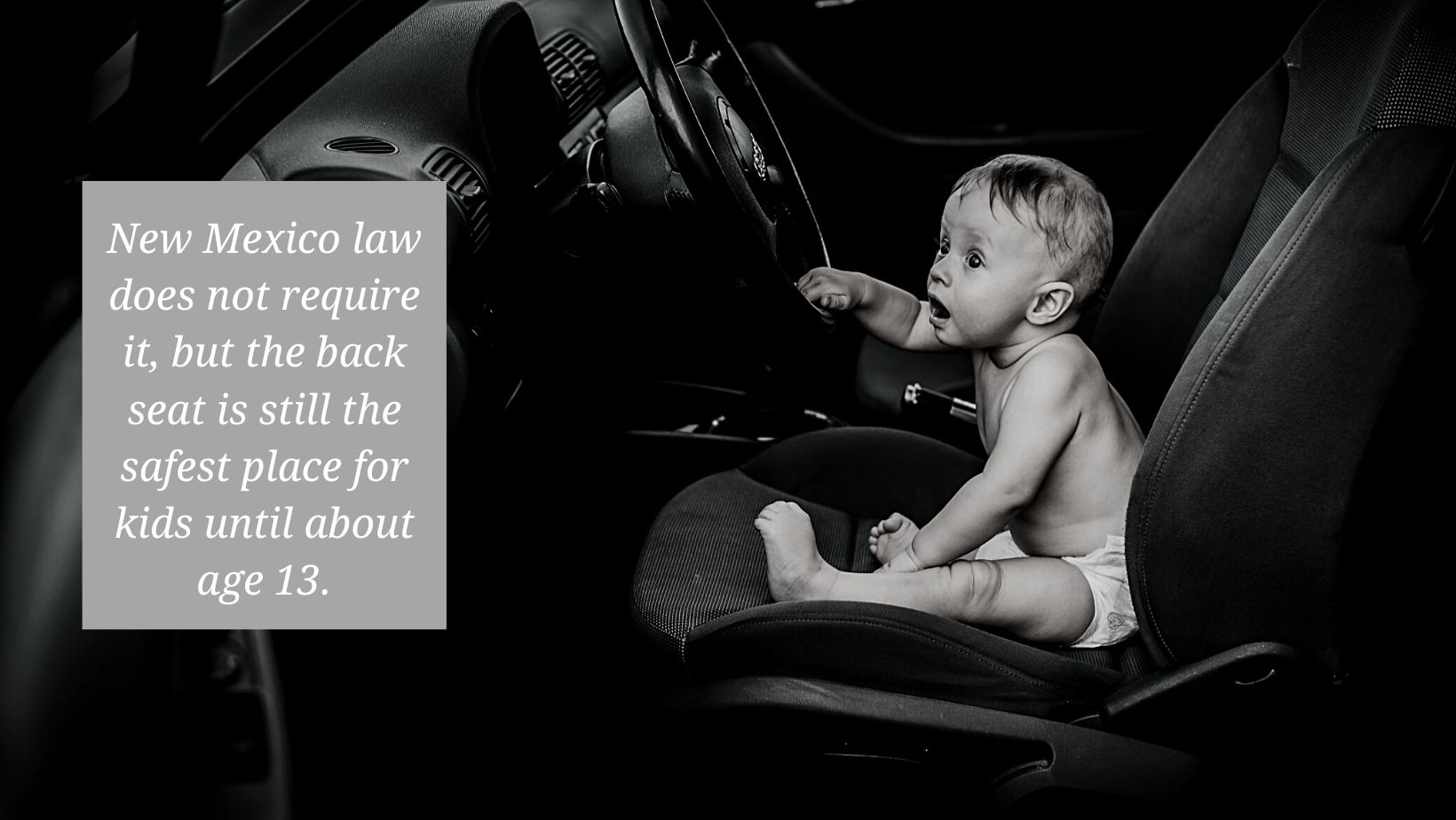 child playing in front seat of car