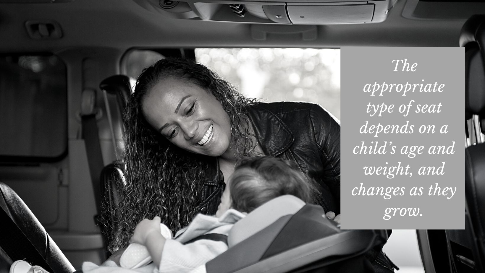 parent checking child is in correct size car seat